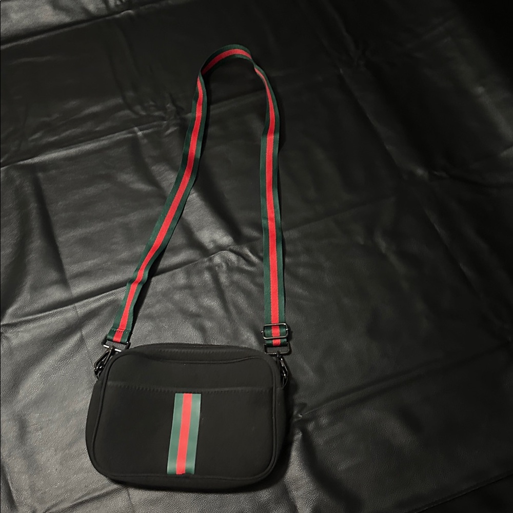 Stylish Black Crossbody Bag with Red and Green Accents - Picture 2 of 12